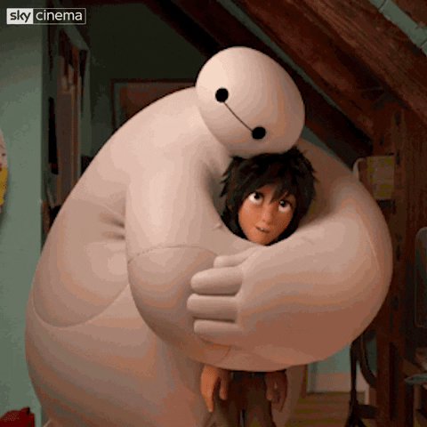 Big Hero 6's Baymax wrapping Hiro in a warm hug
